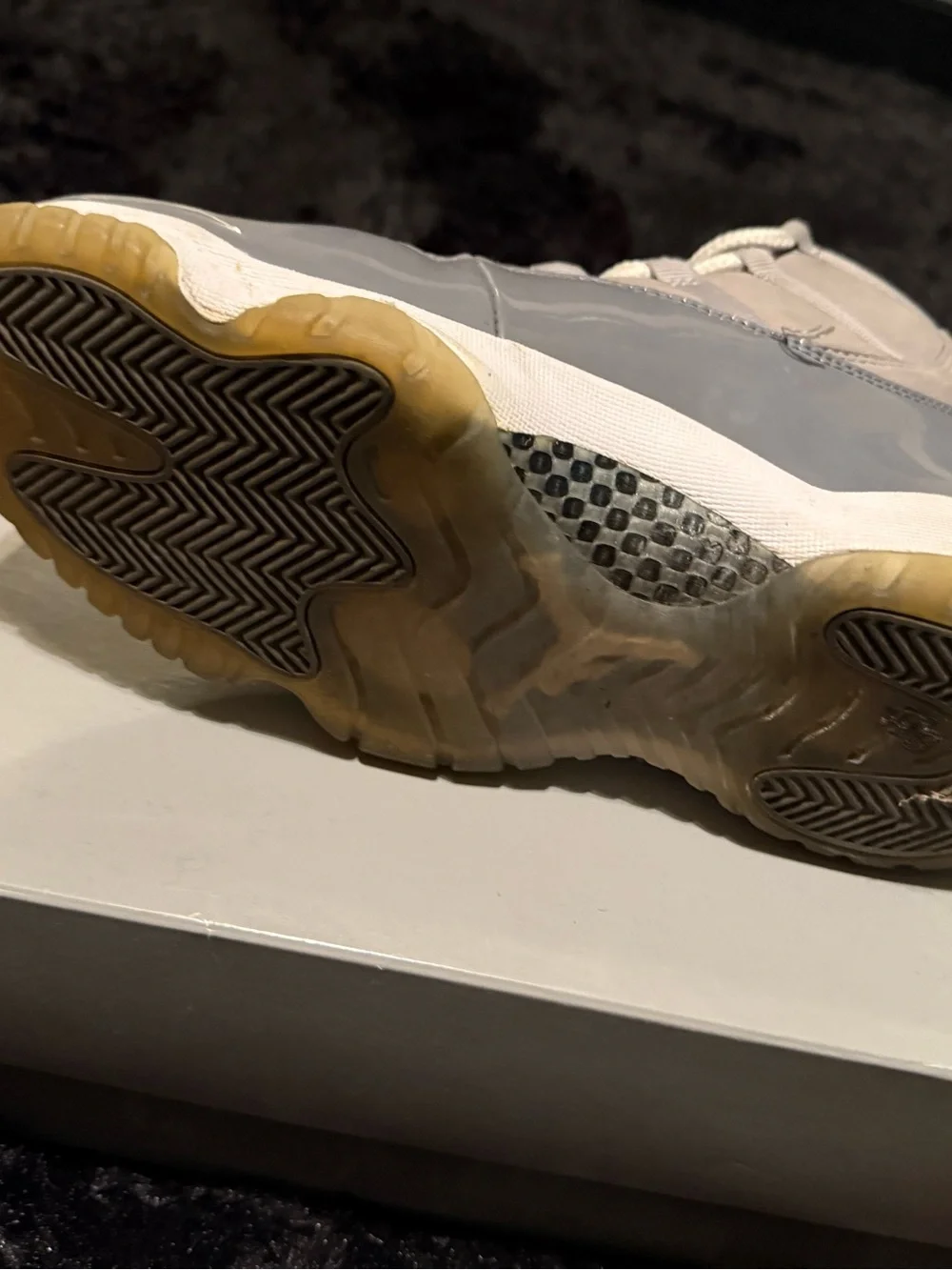 Jordan Retro 11 High-Top Sneakers in Grey and White
